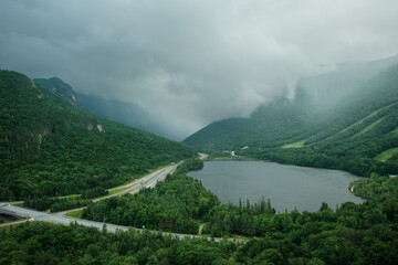View of an incoming storm over Echo Lake from Artists Bluff Lookout, Franconia, New Hampshire