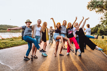 Obraz premium dancing cheerful attractive women at sunset. 