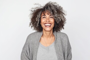 Portrait of beautiful young african american woman with curly hair smiling - Powered by Adobe