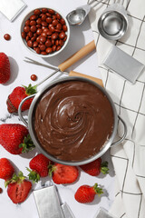 Concept of tasty and sweet food - chocolate fondue
