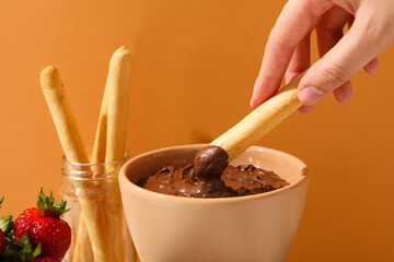 Concept of tasty sweet food - chocolate fondue