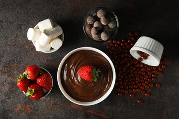 Concept of tasty sweet food - chocolate fondue