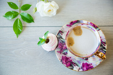 Obraz na płótnie Canvas hot natural coffee with milk in a cup