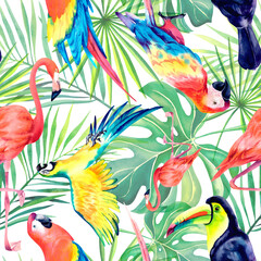 Seamless pattern of red and yellow macaws, flamingos, toucan and palm branches. Watercolor illustration on a white background. Tropical nature.