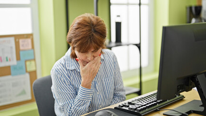 Middle age woman business worker using computer coughing at office