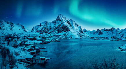 Wonderful snowy winter in Norway. Beautiful night with aurora borealis, in amazing winter landscape of the Lofoten Islands. Snow-covered riverbed and mountains under Northern lights. Creative image. - 622012148
