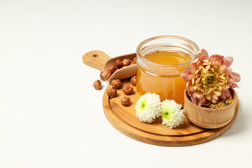 Concept of tasty and sweet food - honey with nuts