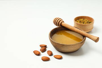 Concept of tasty and sweet food - honey with nuts
