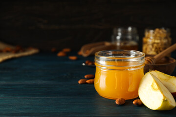 Concept of tasty and sweet food - honey with nuts