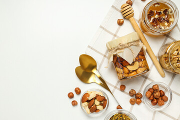 Concept of tasty and sweet food - honey with nuts