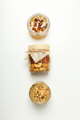 Concept of tasty and sweet food - honey with nuts