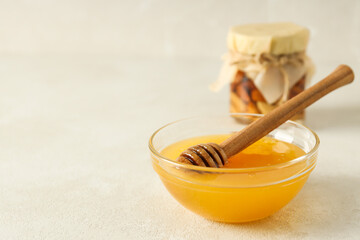 Concept of tasty and sweet food - honey with nuts