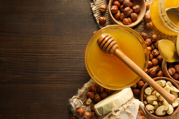 Concept of tasty and sweet food - honey with nuts