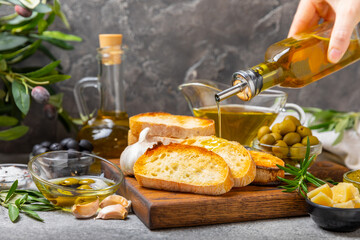 Bruschetta with olive oil, olives, pesto, garlic and parmesan. ciabatta bread with olive oil and spices. Delicacy. Delicious and healthy food. Vegan. Place to copy. copy space.
