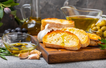 Bruschetta with olive oil, olives, pesto, garlic and parmesan. ciabatta bread with olive oil and spices. Delicacy. Delicious and healthy food. Vegan. Place to copy. copy space.