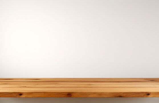 Empty wood table top on white wall background. For product display. High quality photo