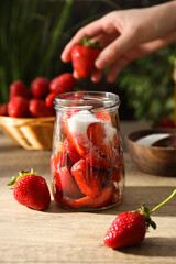 Concept of cooking tasty and sweet food - strawberry jam