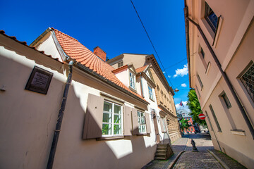 Fototapeta na wymiar Riga streets and ancient buildings on a sunny day, Latvia