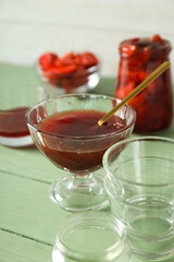 Concept of cooking tasty and sweet food - strawberry jam