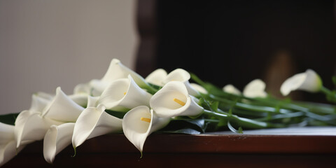 Generative AI, white flowers on the lid of the coffin, ceremony, funeral, ritual, farewell to the deceased, black background, calla lilies, floristic composition, funeral service