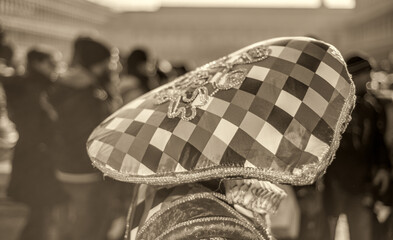 Venice, Italy - February 8th, 2015: People masquerading at the famous Venice Carnival