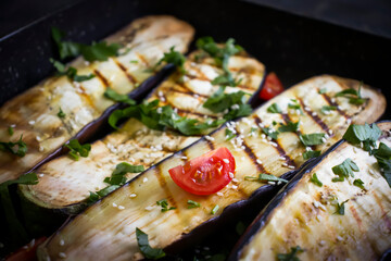 Eggplant fried in a pan background