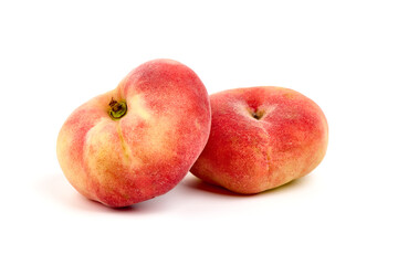 Flat Peaches, ripe nectarines, isolated on white background.