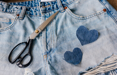 Concept of old jeans reuse and natural resources preserving. Denim Upcycling Ideas