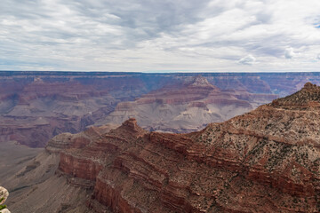 Close up view on Utah agave plant with aerial overlook on rock formation O'Neill Butte seen from Skeleton Point on South Kaibab hiking trail, South Rim, Grand Canyon National Park, Arizona, USA