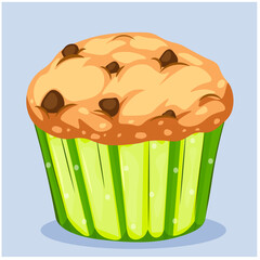 Cupcake with chocolate pieces in green packaging