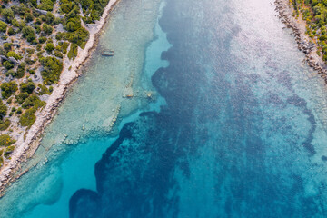 Aerial view of a sea bottom with abstract natural patterns. Summer holyday wallpaper