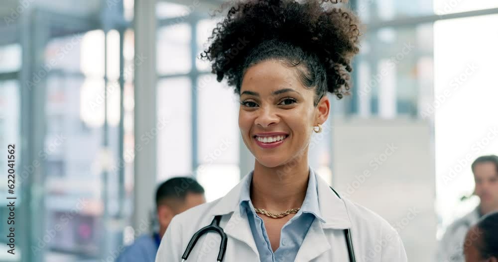 Wall mural Happy woman, doctor and healthcare leadership in meeting, teamwork or planning at hospital. Portrait of confident female person, nurse or medical professional in health or team management at clinic