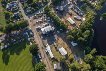 Fototapeta premium Aerial view of a rock festival in the village