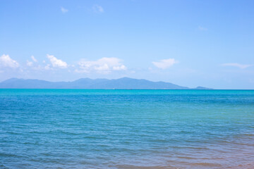 Clear blue sea on the horizon mountains and sky. Sea beautiful landscape. Travel and tourism