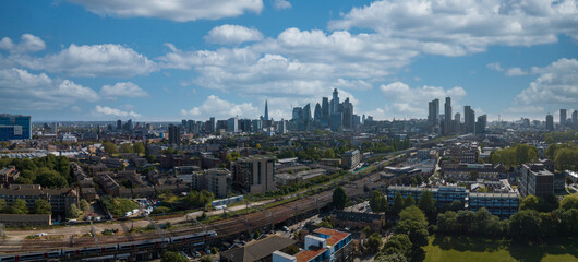 Panoramic aerial view of the city of London center with skyscraper buildings in the background.