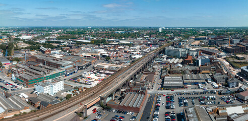 Fototapeta premium View of the skyline of Birmingham, UK including The church of St Martin, the Bullring shopping centre and the outdoor market.