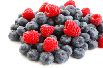 Ripe raspberry and blueberry on white background, closeup