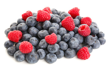 Ripe raspberry and blueberry on white background