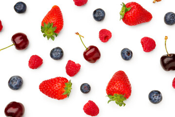 Fototapeta na wymiar Different ripe fresh berries on white background