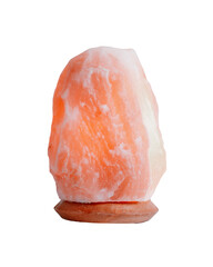 Isolated himalayan salt lamp on table closeup, front view