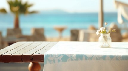 Empty wooden table with white tablecloth for product display on sea beach blurred background. Ai generative