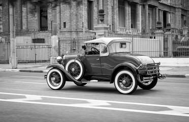 Old car from 1930, Cabriolet, vintage. Photographed in black and white.