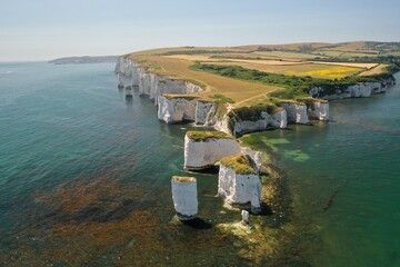 Take in breathtaking Aerial Drone views of the Jurassic coast and unique rock formations on this Old Harry Rocks geological limestone formation © Demir
