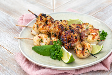 Grilled shrimp skewers. Seafood, shelfish.