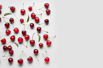 Many sweet cherries on grey background