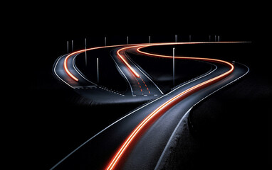 Winding road at night, reflective pavement markings, pylons