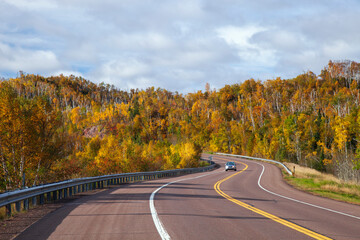 Curve in Highway 61 along north shore of Lake Superior in Minnesota on a bright autumn day