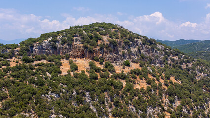 Fototapeta na wymiar Aerial view of caves in Cyaneae Ancient City.