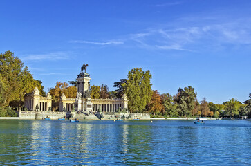 Fototapeta na wymiar The Monument to King Alfonso XII is located in Buen Retiro Park, Madrid, Spain.