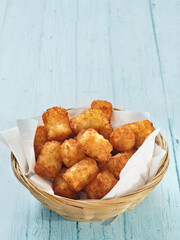 close up of rustic golden potato tater tots